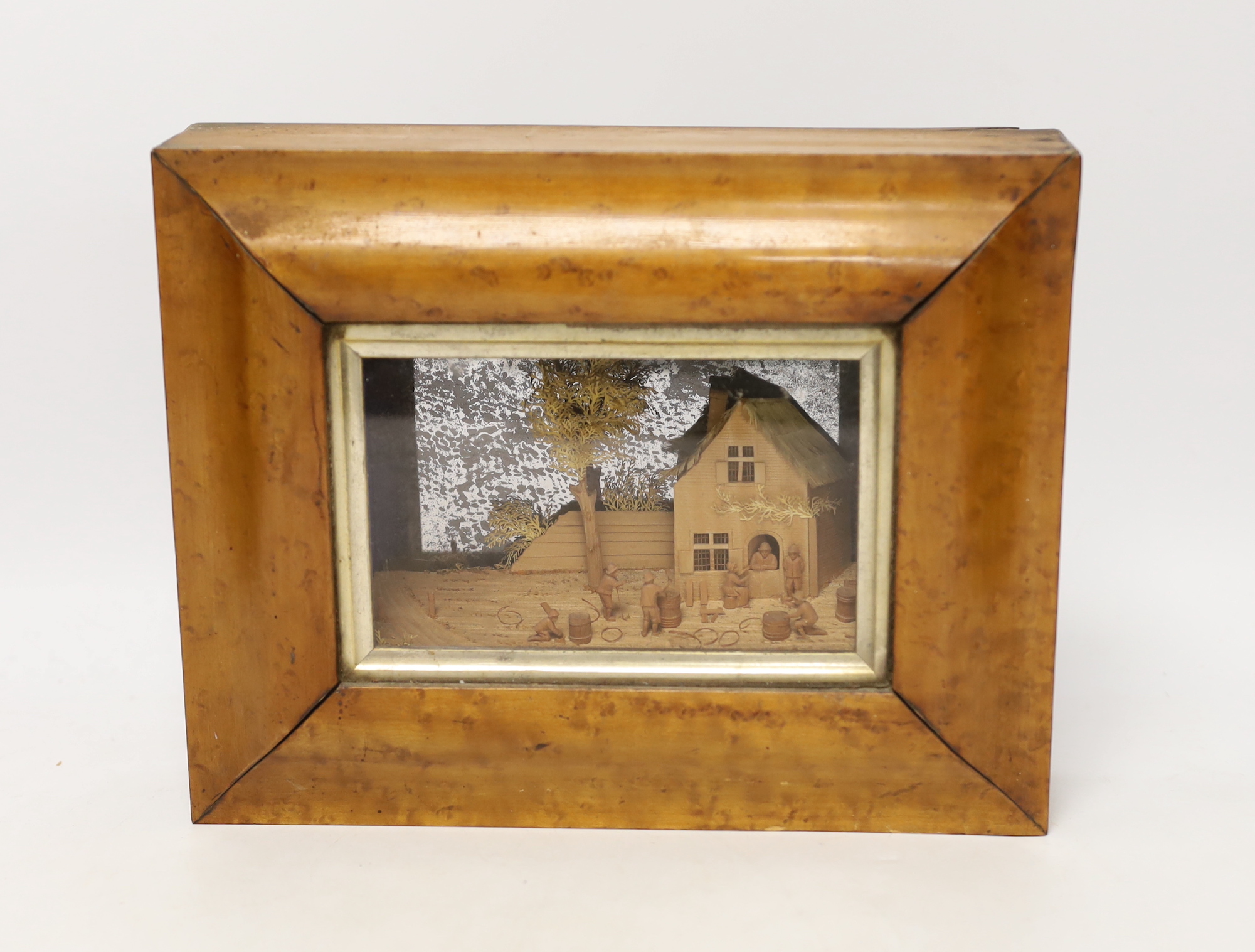 A 19th century maple framed wood diorama of coopers at work, 21 x 27cm total